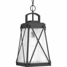 A cottage-inspired outdoor hanging lantern collection with a tapered cage. Creighton features clear water glass clear and Black finish. The frame's linear details are riveted to enhance mechanical detailing of the fixture. Wall, post and hanging lantern options available.