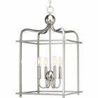 Assembly Hall provides a formal and classic open caged pendant for a variety of traditional and transitional interiors. This Design Series collection features arching frames that are great in scale and surround a candelabra cluster with matching candles. Four-Light Brushed Nickel Foyer Pendant.