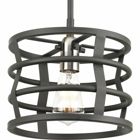 Remix features industrial-inspired pendant options. A Graphite frame is comprised of straps that weave together to create an open cage design. Brushed Nickel accents on the inside add a touch of mixed metal accents. This one-light mini-pendant is part of our Design Series Collections.