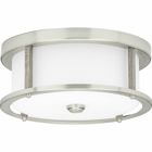 Rejuvenate from the rush and flurry of a busy day with the Mast two-light flush mount. The incorporation of faux wood accents and an oversized, Brushed Nickel frame holding etched glass shades creates a natural and organic touch for bathrooms, living rooms, and bedrooms in coastal and modern farmhouse interiors.