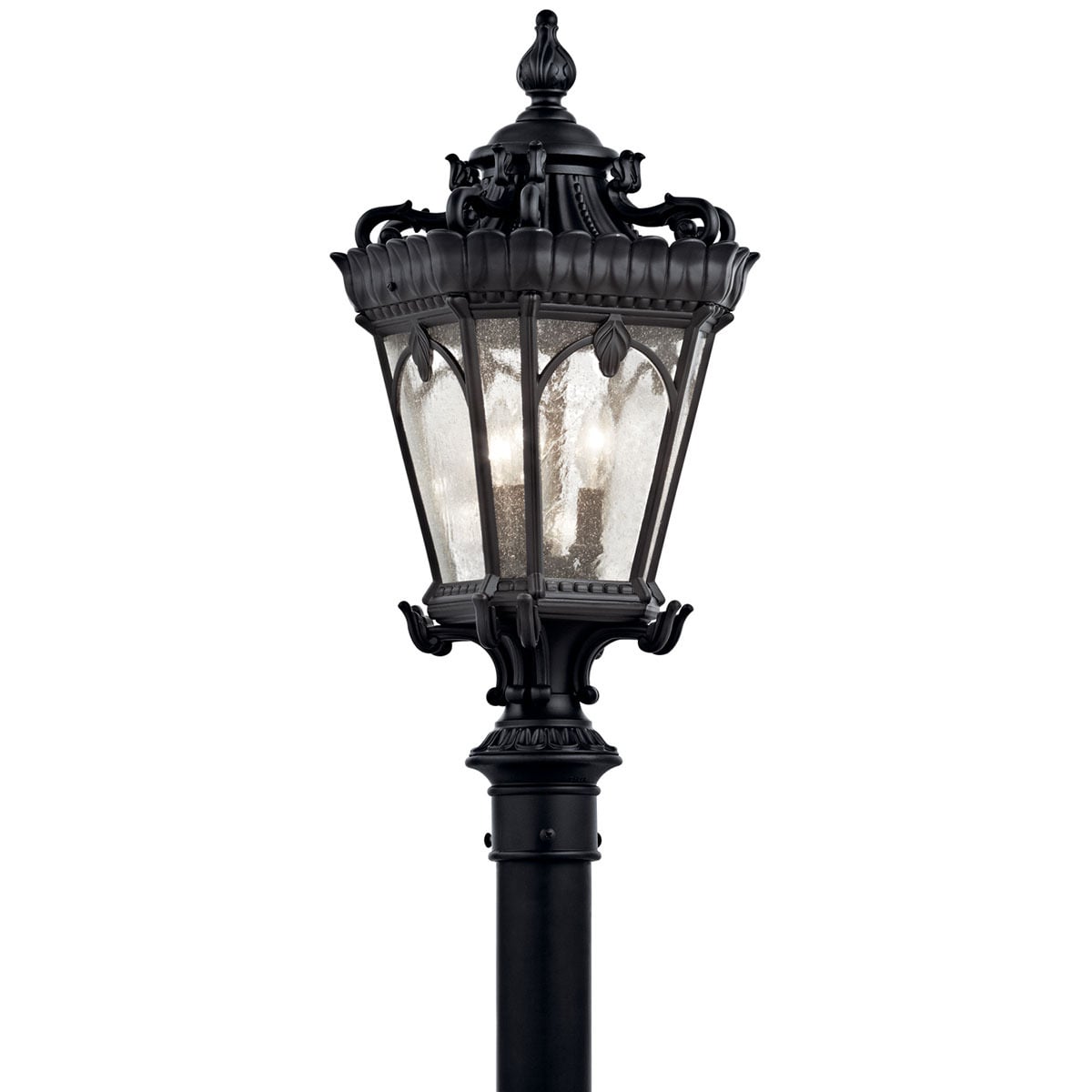 The Tournai(TM) 27in; 3 Light outdoor post light features an ornate look with its clear seeded glass and Textured Black finish. The Tournai wall light works in a traditional environment.