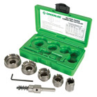Quick Change Carbide Tipped Hole Cutter Kit.  Includes 7/8", 1-1/8", 1-3/8" and 2" Cutter Heads, Arbor, Hex Key and Case.  Cuts stainless steel quickly and easily.  Quick Change arbor allows you to change cutter heads with a simple push and a turn.  Use the same arbor for different size cutting heads.  Removable cutter heads available in sizes from 5/8" through 3".  Flange stop prevents over-drilling.  Ejector spring on all sizes above 3/4" makes removal of slug easier.  Replaceable, cobalt-steel pilot drill with split-point tip to prevent walking.  Precision carbide teeth for optimum performance and durability.  Minimum chuck size of 3/8".