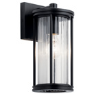 The Barras(TM)  11.5in; 1 light outdoor wall light features a classic look with its Black finish and clear ribbed glass. Inspired by the early electric era style, it is sleek and stately. A perfect addition in several aesthetic outdoor environments, including traditional and transitional.