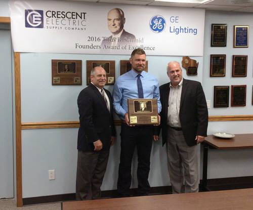 Photograph of Eric Jansen receiving award